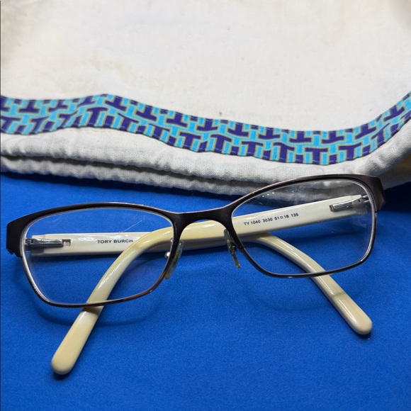 Tory Burch glasses stainless steel and resin? Frames only